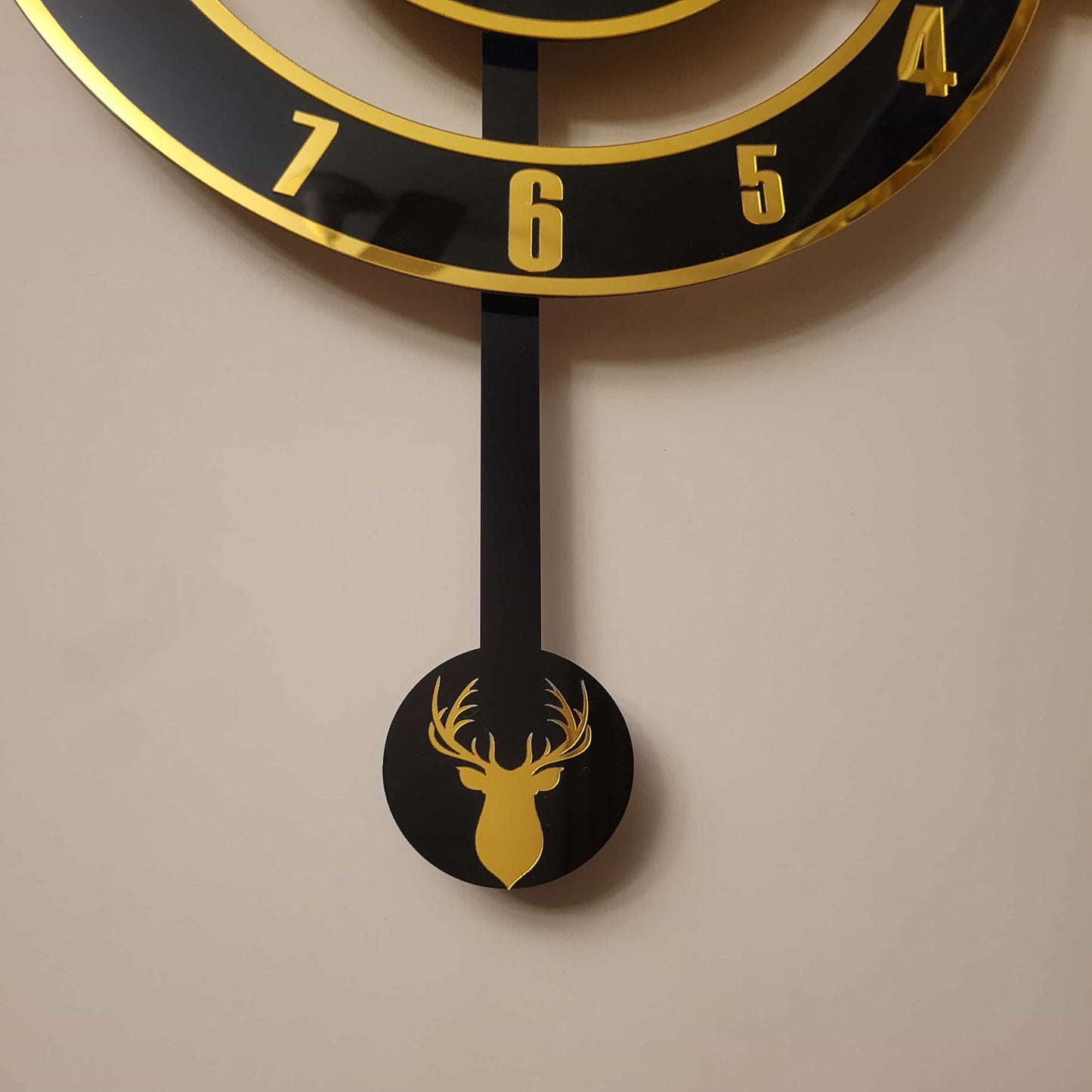 Modern Dual-Layer Deer Pendulum Acrylic Wall Clock – Black & Gold (16 Inches)